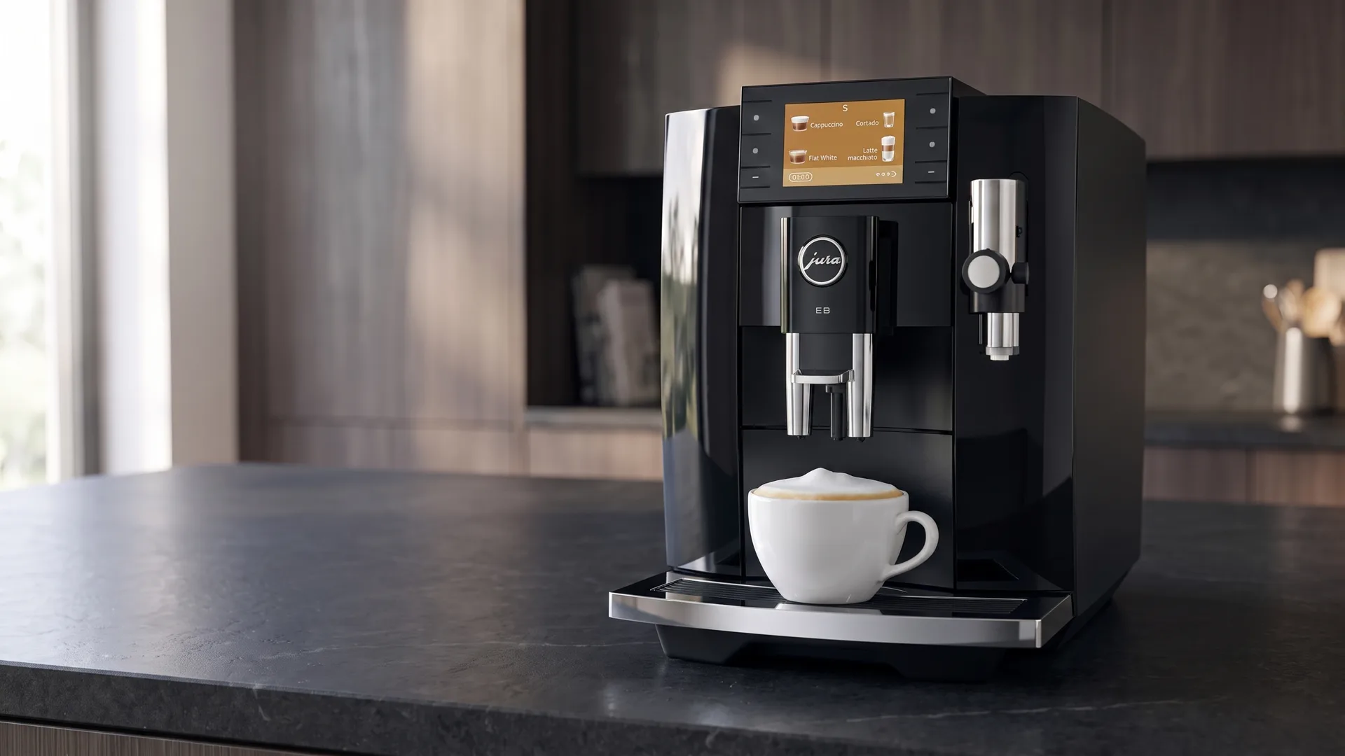 Black 5th-generation Jura E8 in a modern kitchen