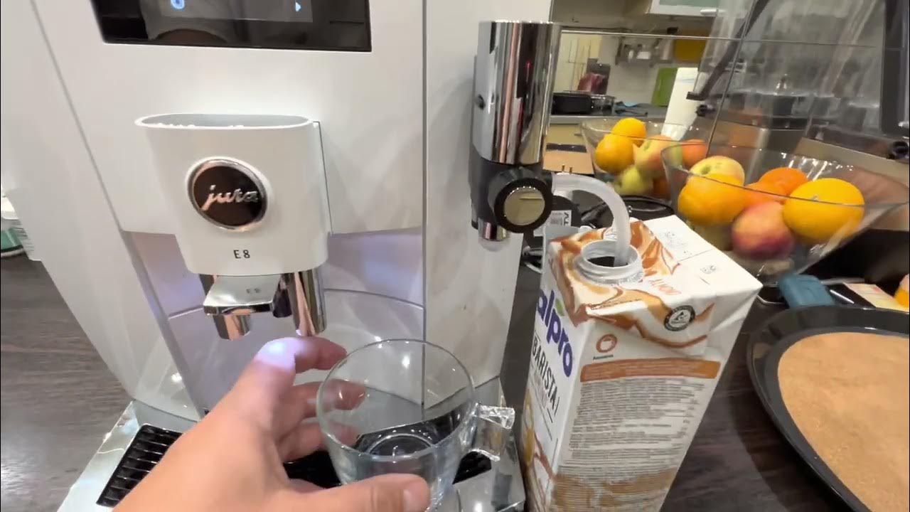 Jura E8 real-world close-up with milk setup